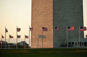 Washington Monument with flags flying