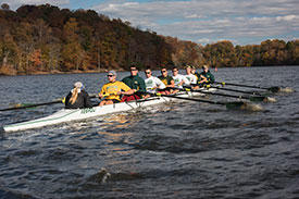 Mason Crew team, rows down Potomac River